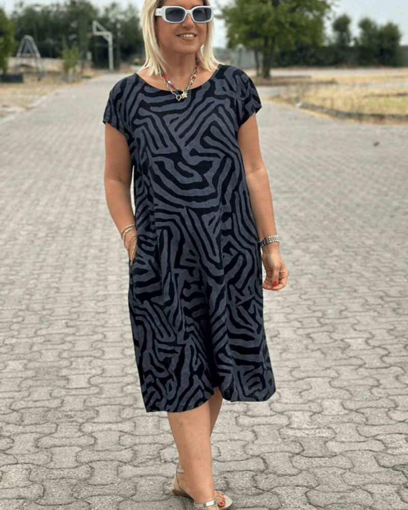 Christina™ | Sommerkjole med Rund Hals og Elegant Print