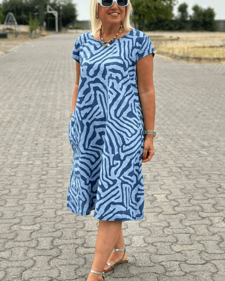 Christina™ | Sommerkjole med Rund Hals og Elegant Print