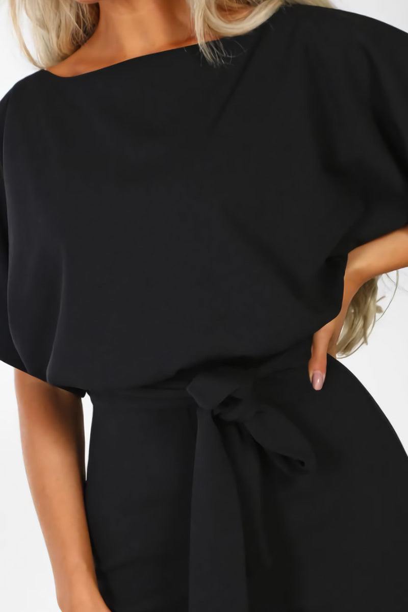 Stella | Kvinders Bukse-jumpsuit med Bælte og Flatterende Ærmer