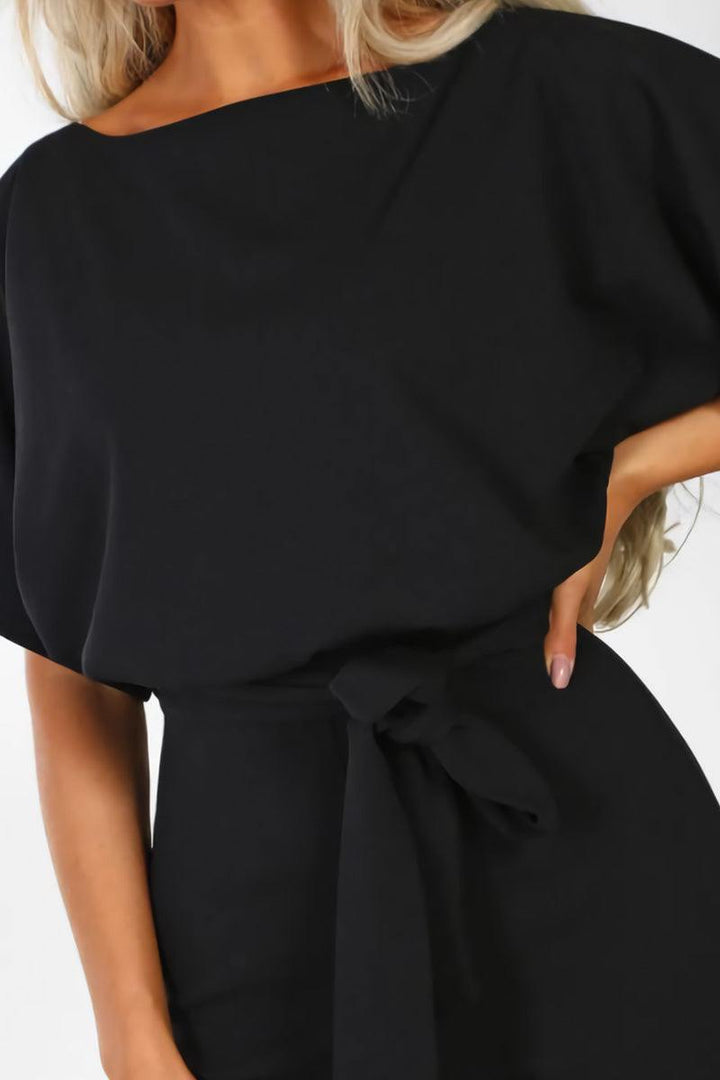 Stella | Kvinders Wide-Leg Belted Jumpsuit med Batwing Ærmer