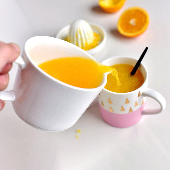 Manuel Citrus Saftpresser i Elegant Hvid Keramik