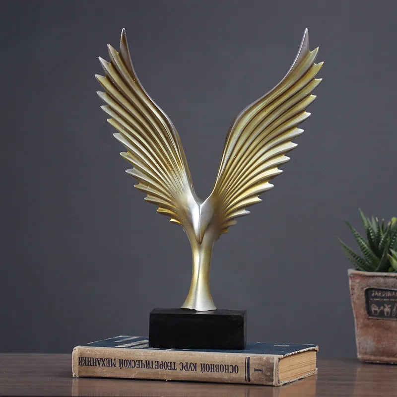 Elegant Ørneskulptur i Guld og Sort Harpiks