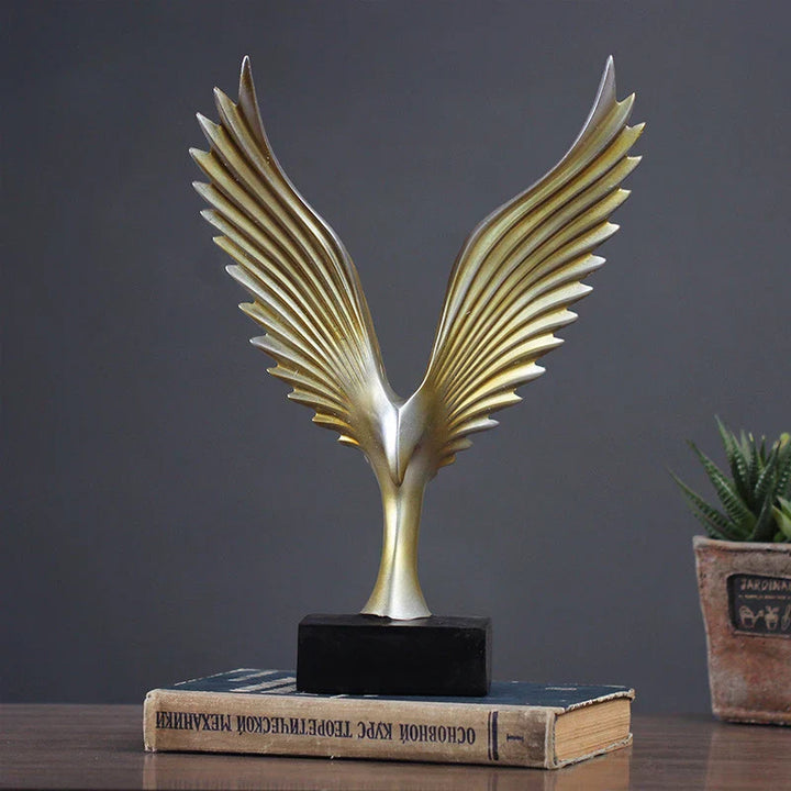 Elegant Ørneskulptur i Guld og Sort Harpiks