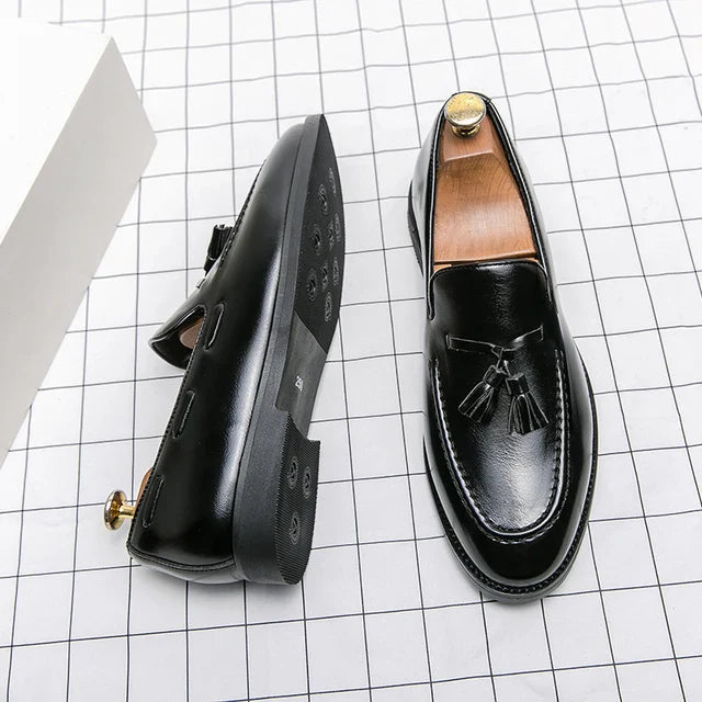 Loafers til mænd med kvast-detalje