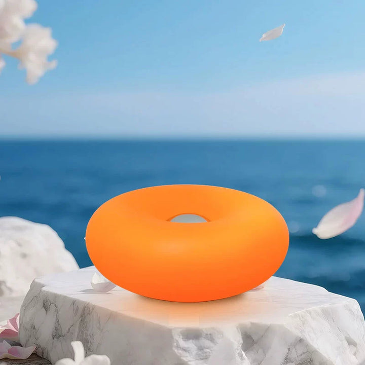 Donut-formet berøringsstyret natlampe i creme
