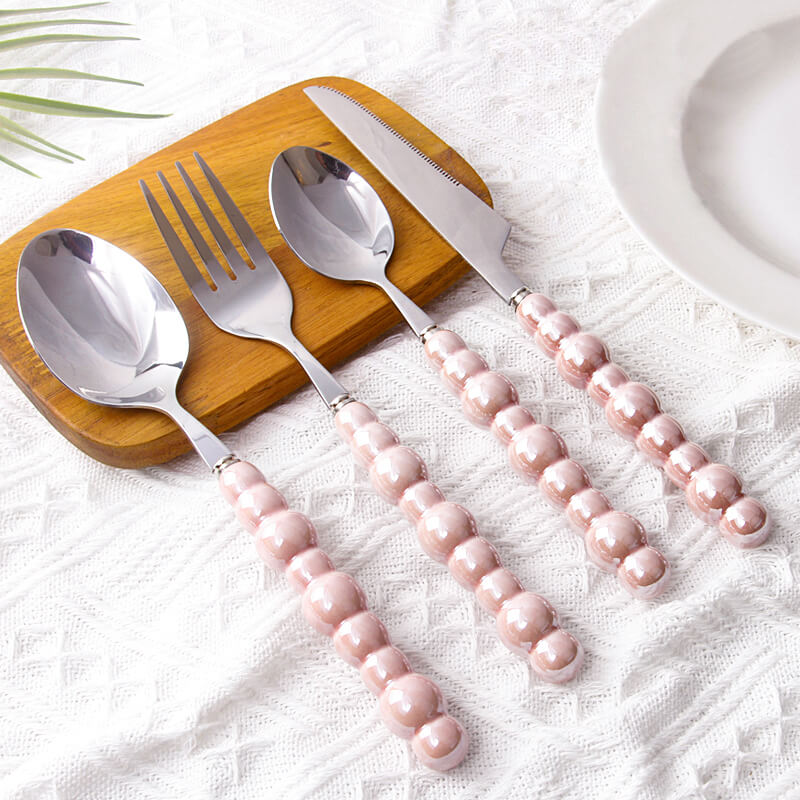 Elegant Bestik Sæt med Perlemorshåndtag i Rustfrit Stål