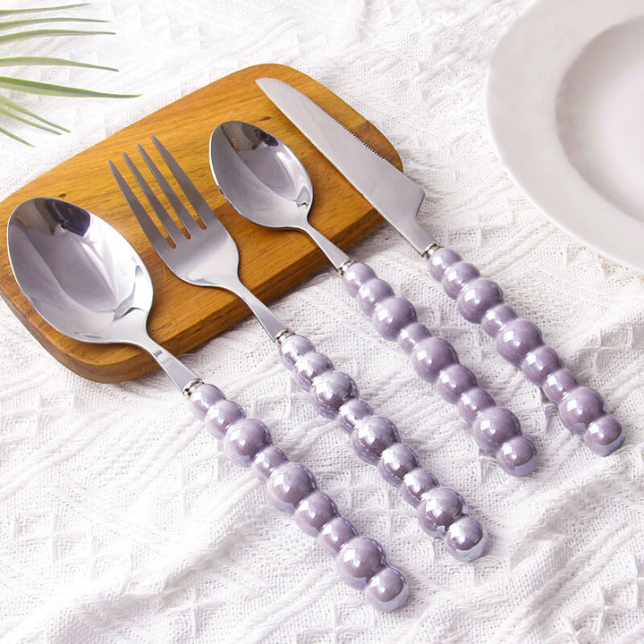 Elegant Bestiksæt i Rustfrit Stål med Perle Håndtag - 4 Stykker