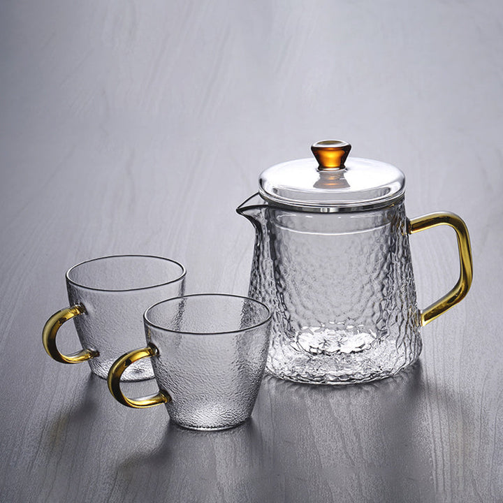 Elegant Varmebestandig Glas Teapot med Gyldent Håndtag og Si