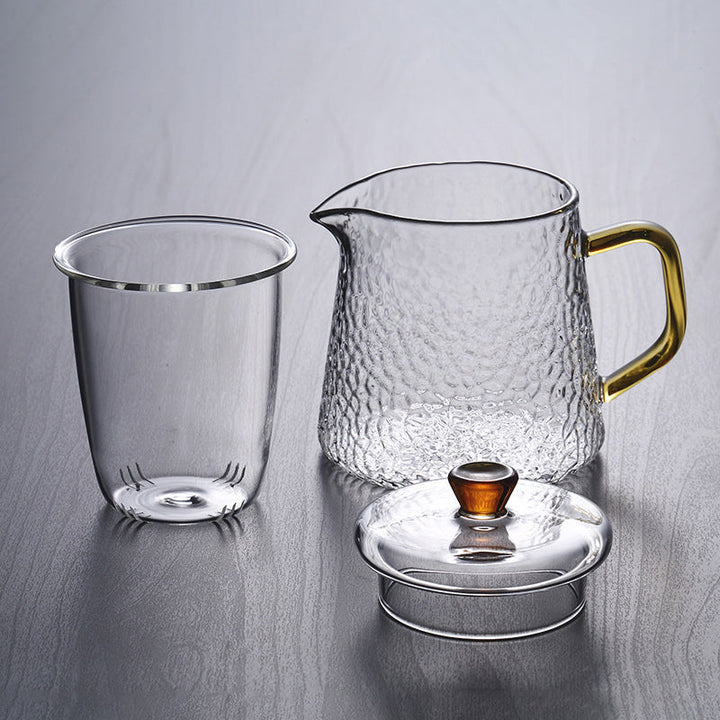 Elegant Varmebestandig Glas Teapot med Gyldent Håndtag og Si