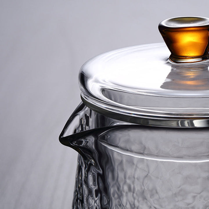 Elegant Varmebestandig Glas Teapot med Gyldent Håndtag og Si