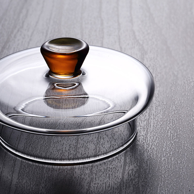 Elegant Varmebestandig Glas Teapot med Gyldent Håndtag og Si