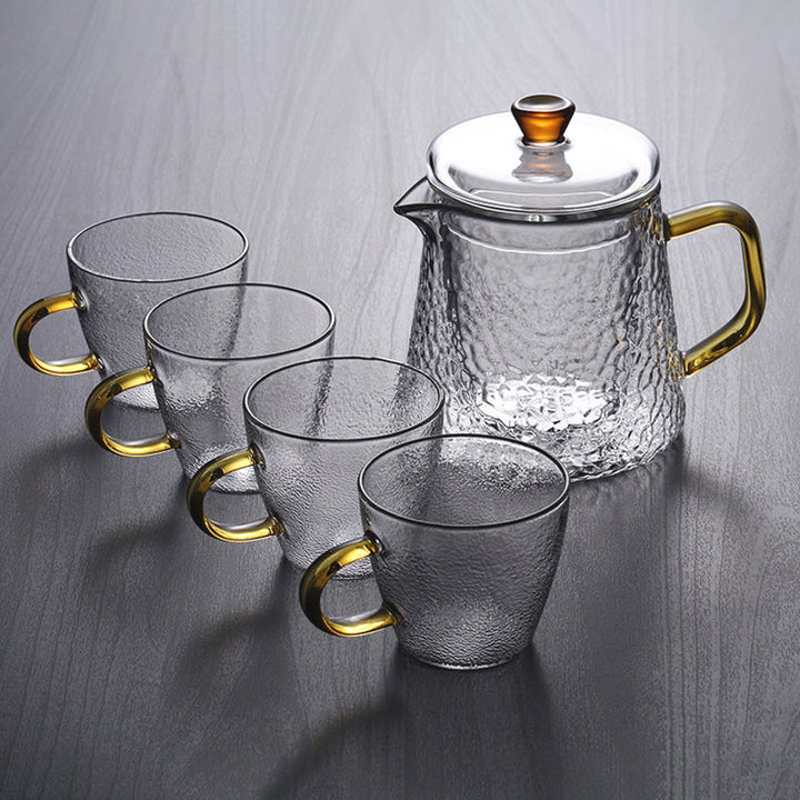 Elegant Varmebestandig Glas Teapot med Gyldent Håndtag og Si