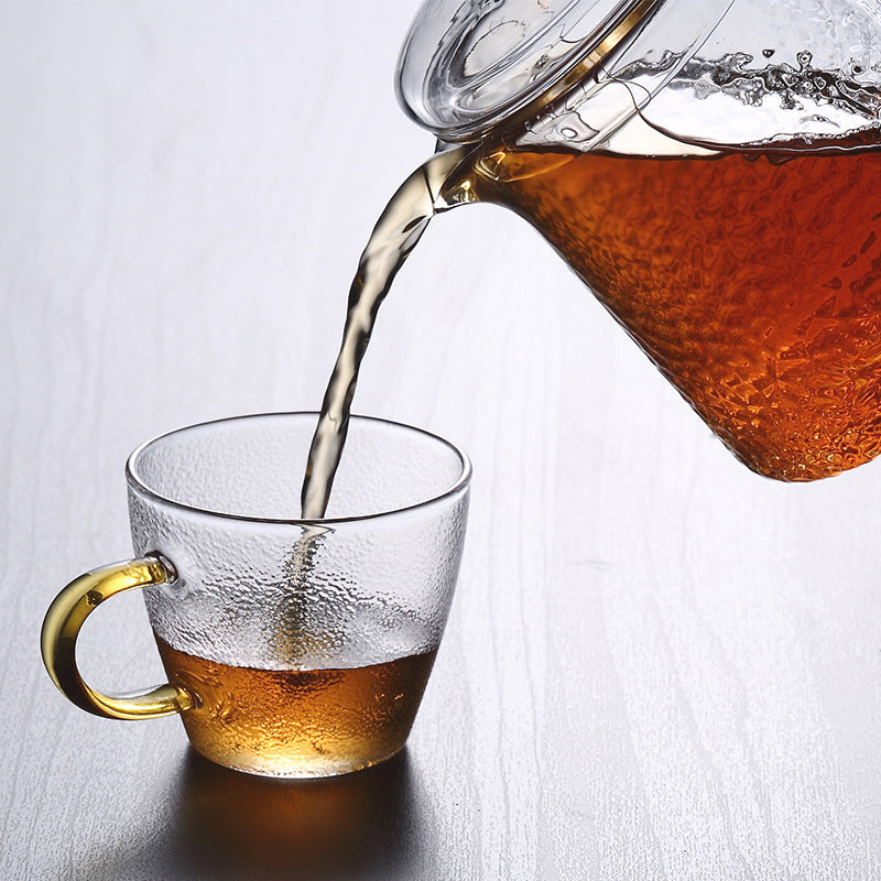 Elegant Varmebestandig Glas Teapot med Gyldent Håndtag og Si