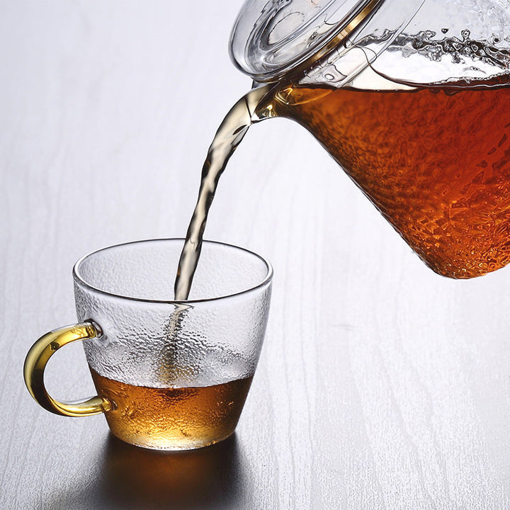 Elegant Varmebestandig Glas Teapot med Gyldent Håndtag og Si