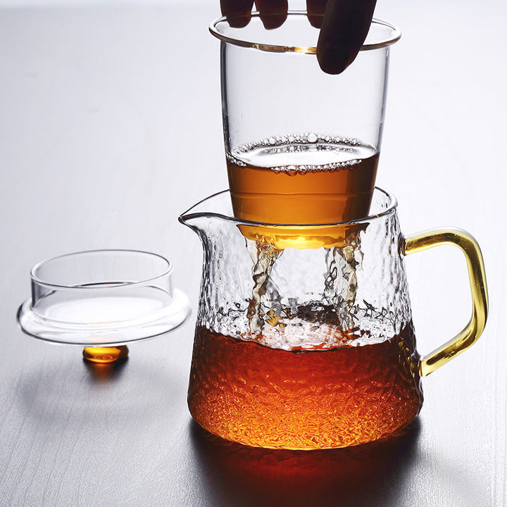 Elegant Varmebestandig Glas Teapot med Gyldent Håndtag og Si