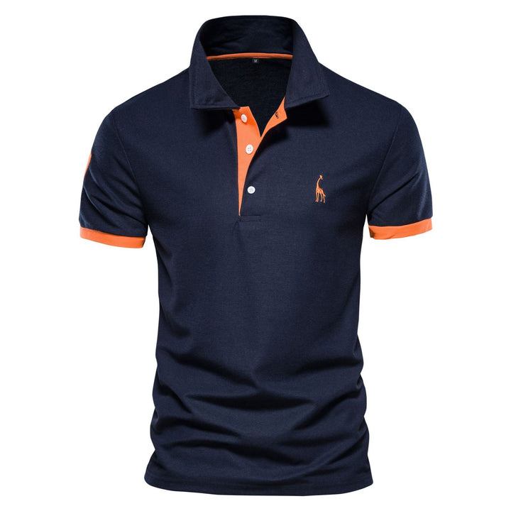 Poloshirt med girafbroderi og kontrastkrave