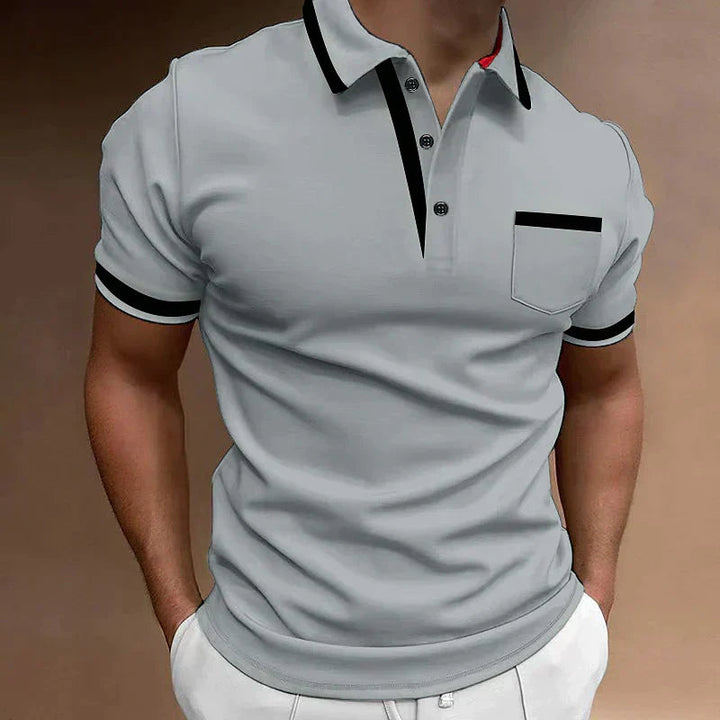 Poloshirt med brystlomme og kontrastkrave