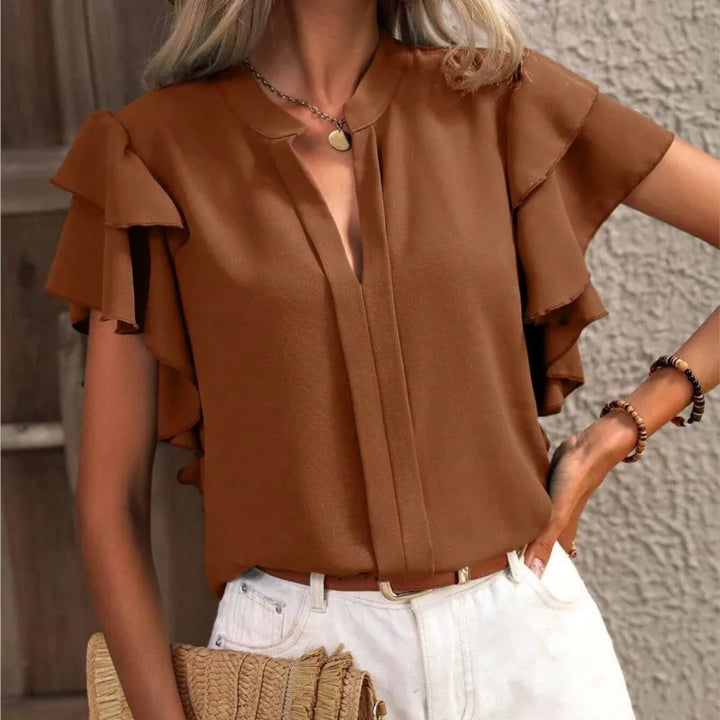 Amira™ | Stilfuld Bluse med Elegante Flæser