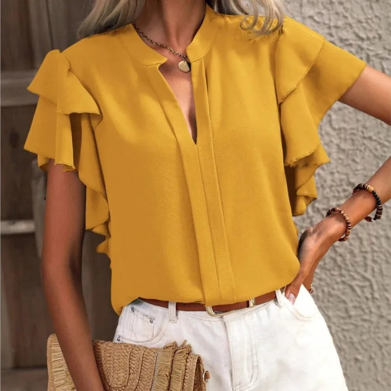 Amira™ | Stilfuld Bluse med Elegante Flæser