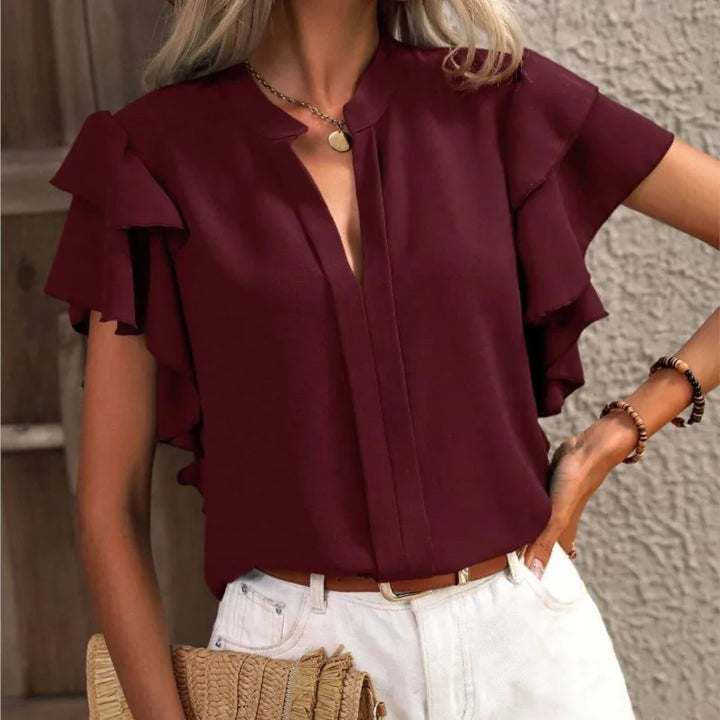 Amira™ | Stilfuld Bluse med Elegante Flæser