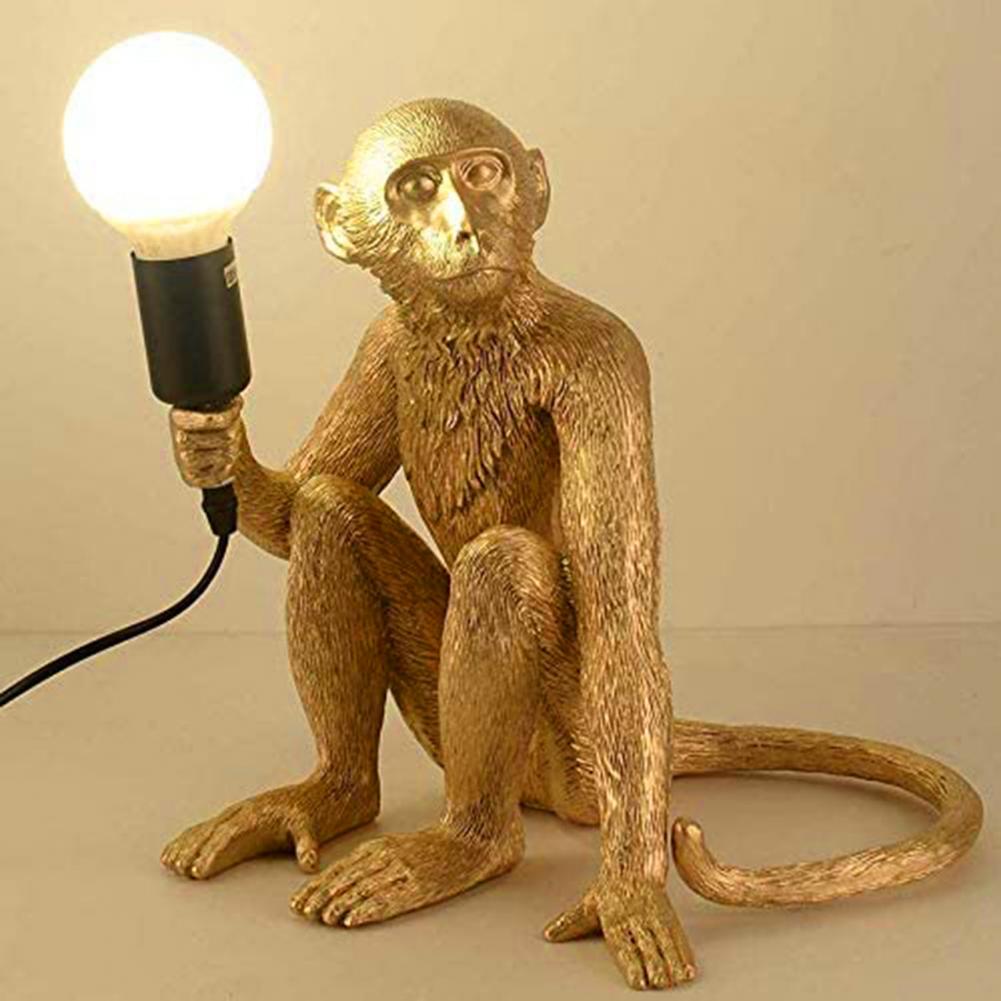 Siddende Abe Bordlampe i Holdbar Resin