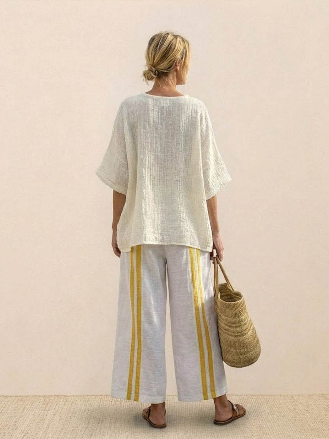 Paloma | Kvinders afslappede stribede bukser med bred ben og t-shirt to-delt sæt