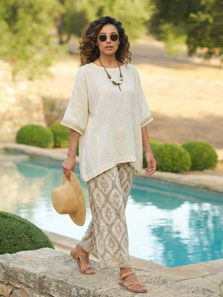 Paloma | Kvinders afslappede stribede bukser med bred ben og t-shirt to-delt sæt