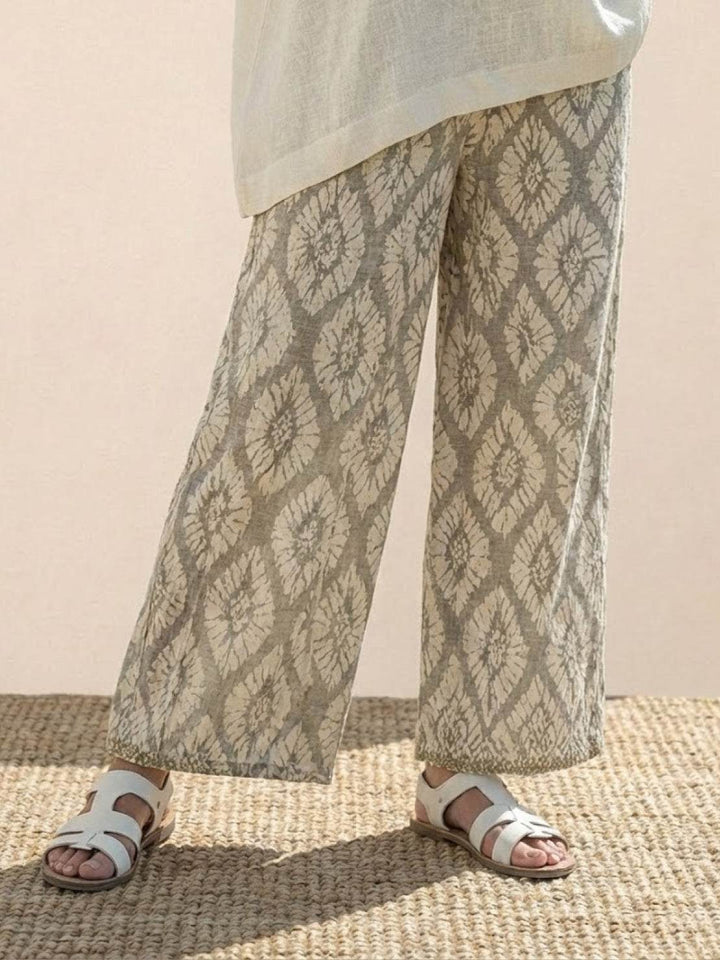 Paloma | Kvinders afslappede stribede bukser med bred ben og t-shirt to-delt sæt