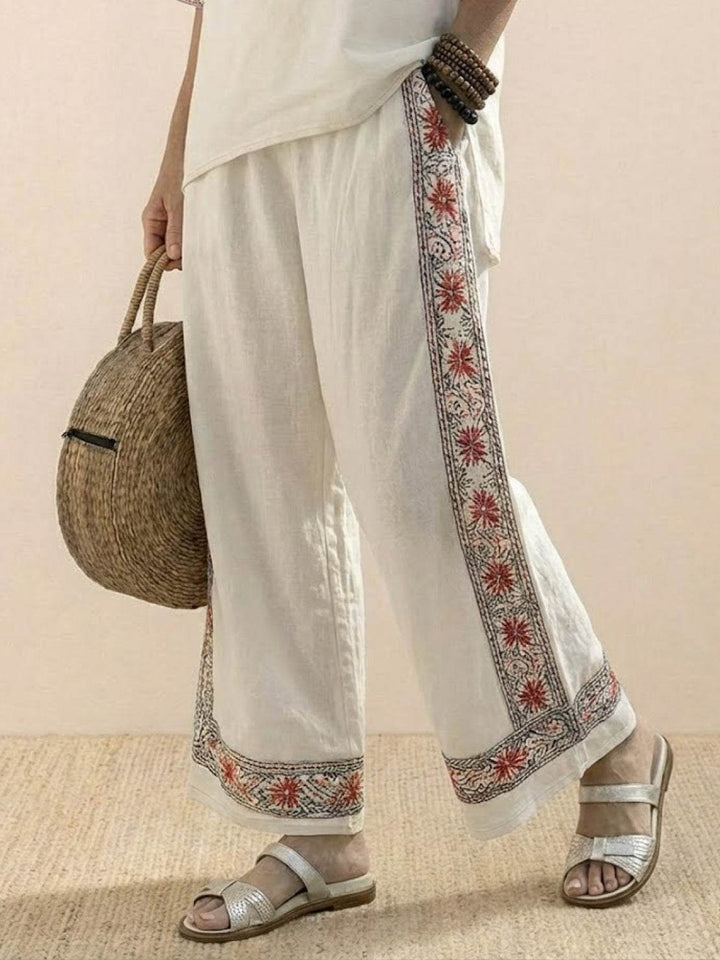 Paloma | Kvinders afslappede stribede bukser med bred ben og t-shirt to-delt sæt