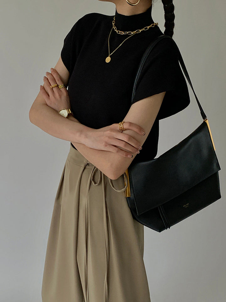 Noira | Kvinders ærmeløs mock neck top med polstrede skuldre