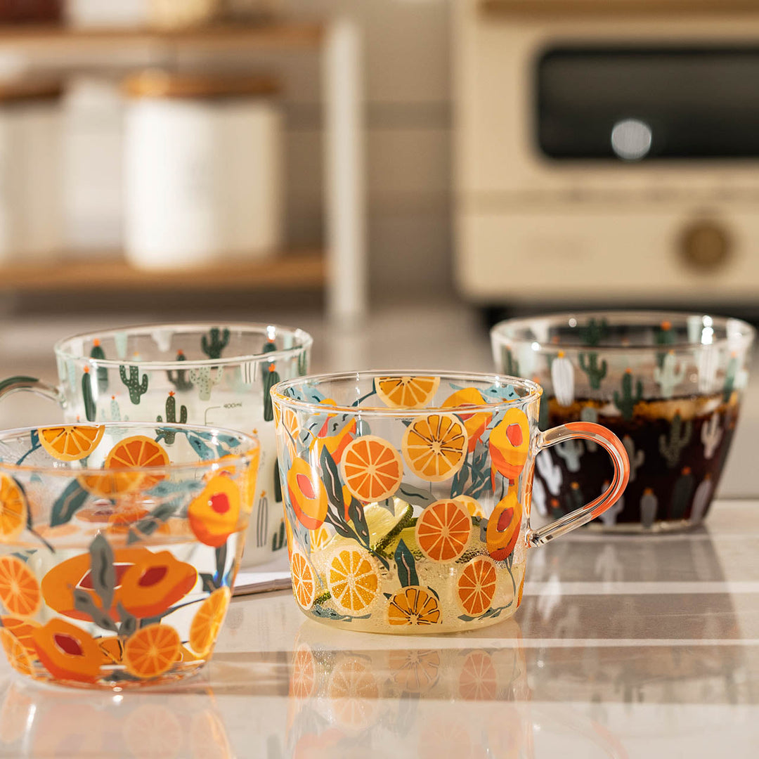 Glas Målebæger med Fersken- og Kaktusdesign