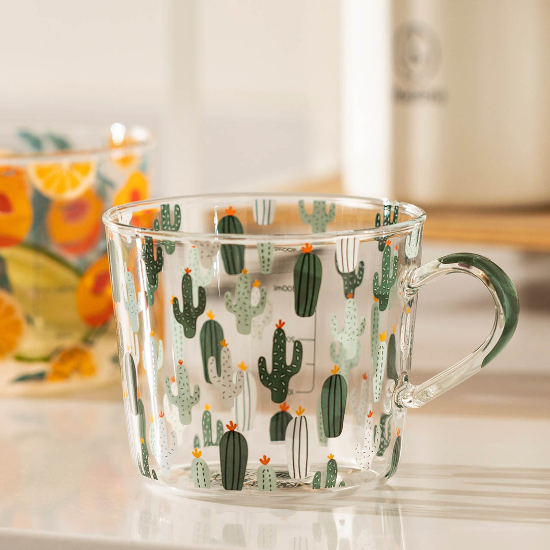 Glas Målebæger med Fersken- og Kaktusdesign