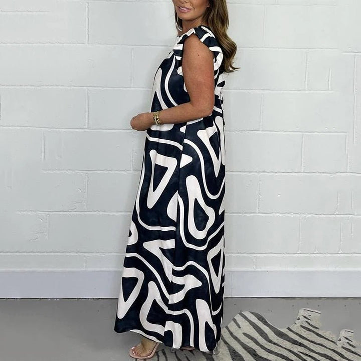 Nova | Kvinders Abstrakt Print V-Hals Volangærmer Bred Ben Jumpsuit